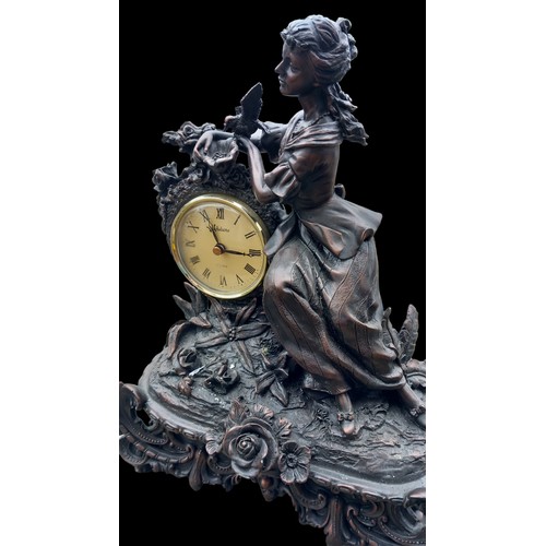 150 - A BRONZED FINISHED FIGURED CLOCK 15X12