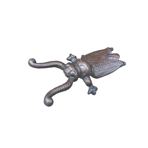 165 - A VINTAGE CAST IRON BEETLE BOOT REMOVER