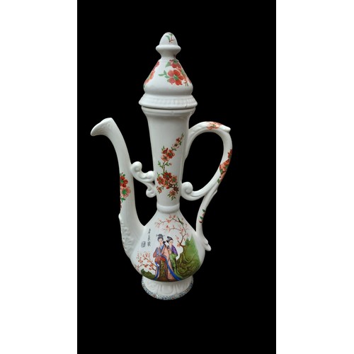67 - A LARGE ORIENTAL TEAPOT WITH MARKINGS 20