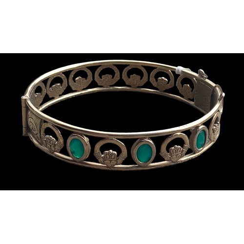 177 - 18CT GOLD PLATED CELTIC BANGLE SET WITH A GREEN STONE