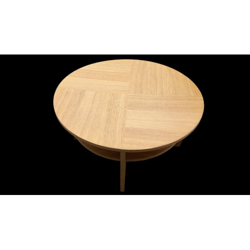 84 - A ROUND 2 TIER RETRO STYLE COFFEE TABLE