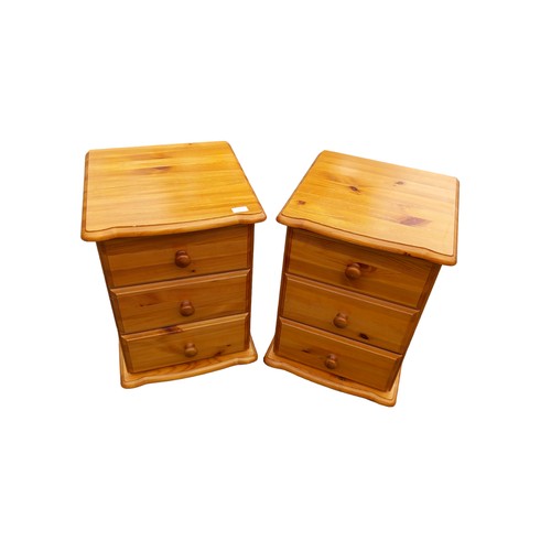 98 - A PAIR OF 3 DRAWER PINE BEDSIDE CHESTS