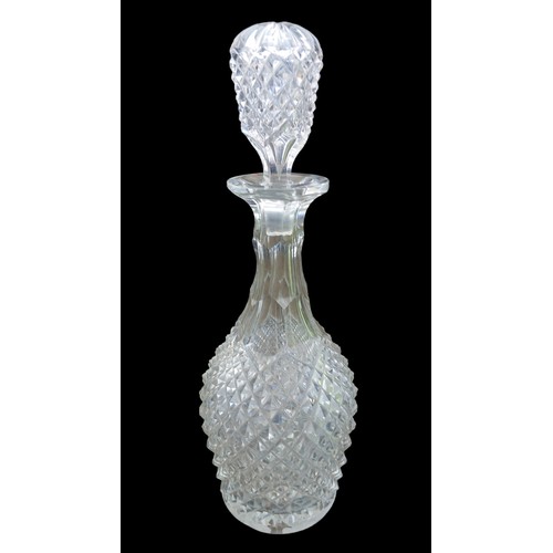 107 - AN EARLY CUT GLASS DECANTER