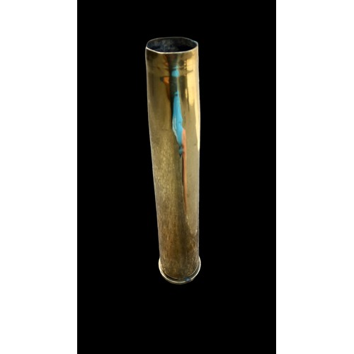 691 - A BRASS MILITARY SHELL