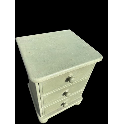 11 - A PAINTED GREEN 3 DRAWERED BEDSIDE