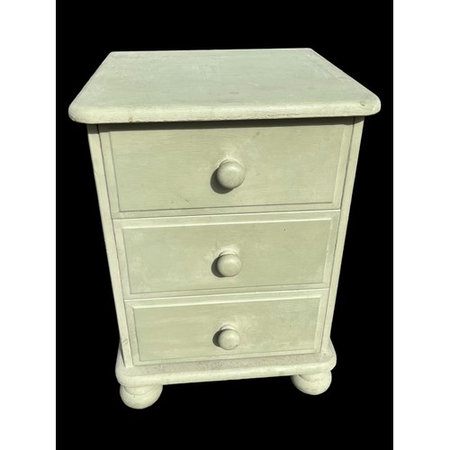 11 - A PAINTED GREEN 3 DRAWERED BEDSIDE