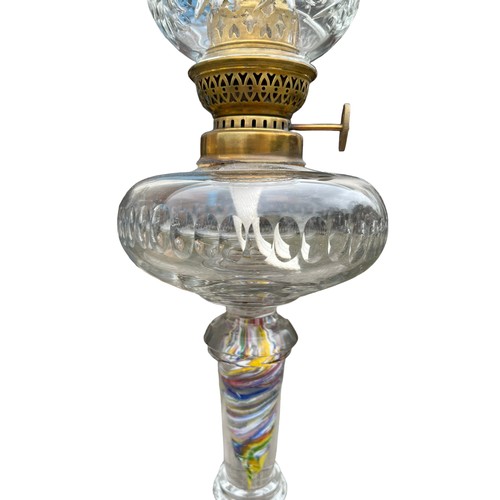 107 - AN ANTIQUE ONE PIECE CUT GLASS OIL LAMP STEM IN FABULOUS TWIST COLOUR GLASS WITH CUT GLASS BOWL AND ... 