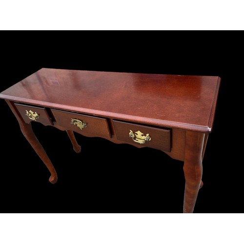 182 - A 3 DRAWER MAHOGANY CONSOL TABLE ON CAB LEG