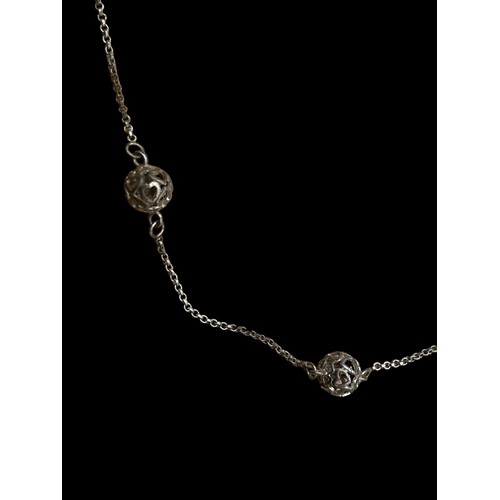 208 - A SILVER BALL CHAIN