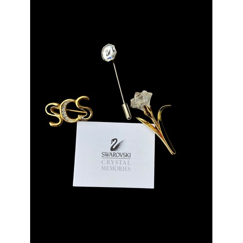 218 - A SAWROVSKI CRYSTAL STICK/HAT PIN & 2 SWAROVSKI BROOCH/BADGES