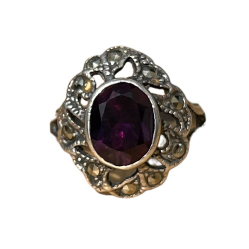 228 - A SILVER AMETHYST AND MARCASITE RING