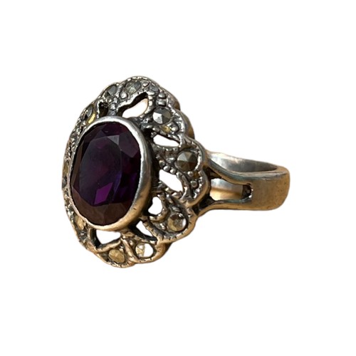 228 - A SILVER AMETHYST AND MARCASITE RING