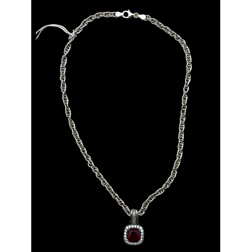 260 - A SILVER AND RUBY FOB ON SILVER CHAIN