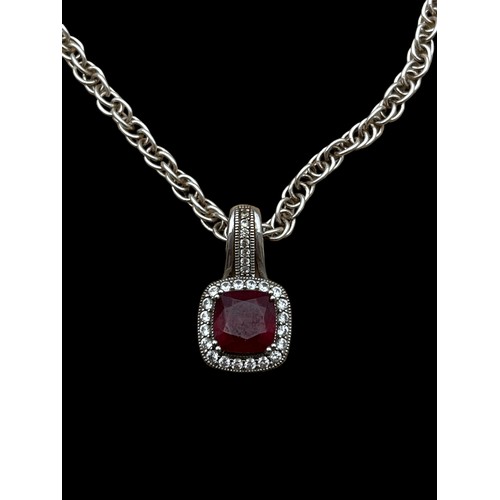 260 - A SILVER AND RUBY FOB ON SILVER CHAIN