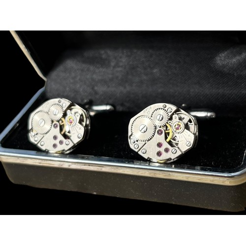 267 - CUFFLINKS MADE OF 17 JEWELL WATCH MOVEMENTS , CLOCKWORK