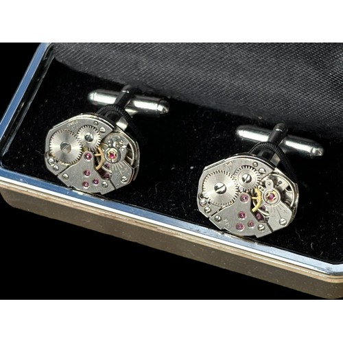 267 - CUFFLINKS MADE OF 17 JEWELL WATCH MOVEMENTS , CLOCKWORK