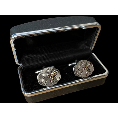 267 - CUFFLINKS MADE OF 17 JEWELL WATCH MOVEMENTS , CLOCKWORK