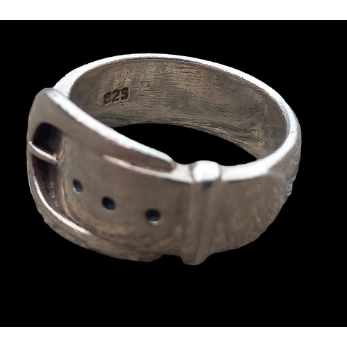 294 - A SILVER BELT & BUCKLE RING