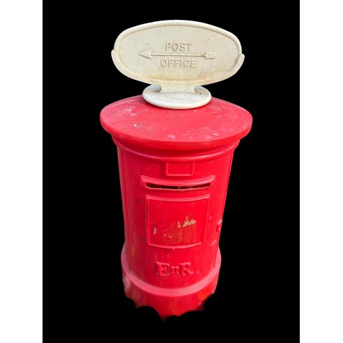 311 - A POST BOX MONEY BOX WITH MARBLES