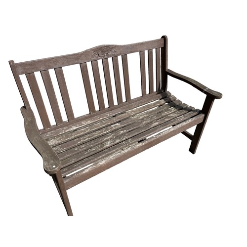 341 - A WOODEN GARDEN BENCH