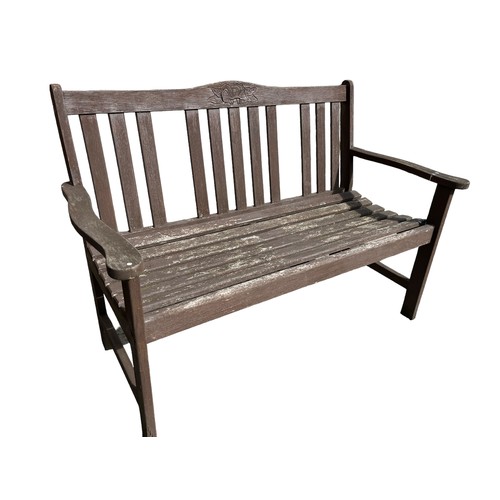 341 - A WOODEN GARDEN BENCH