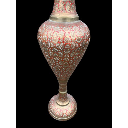 432 - A TALL BRASS VASE **