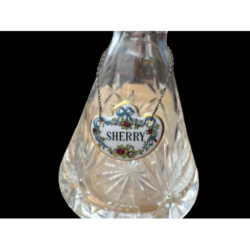 445 - A TYRONE CRYSTAL DECANTER COMPLETE WITH STOPPER AND AN ANYSLEY PORCELAIN SHERRY LABEL