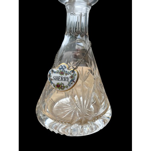 445 - A TYRONE CRYSTAL DECANTER COMPLETE WITH STOPPER AND AN ANYSLEY PORCELAIN SHERRY LABEL