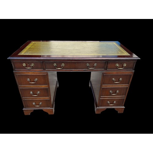 459 - A TOOLED GREEN LEATHER TOPPED MAHOGANY TWIN PEDASTAL DESK IN EXCELLENT CONDITION **