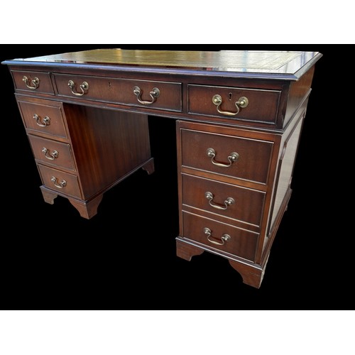 459 - A TOOLED GREEN LEATHER TOPPED MAHOGANY TWIN PEDASTAL DESK IN EXCELLENT CONDITION **