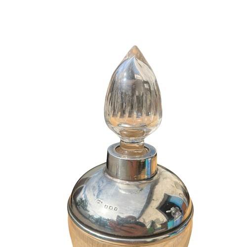 486 - A SILVER TOPPED PERFUME BOTTLE WITH STOPPER **