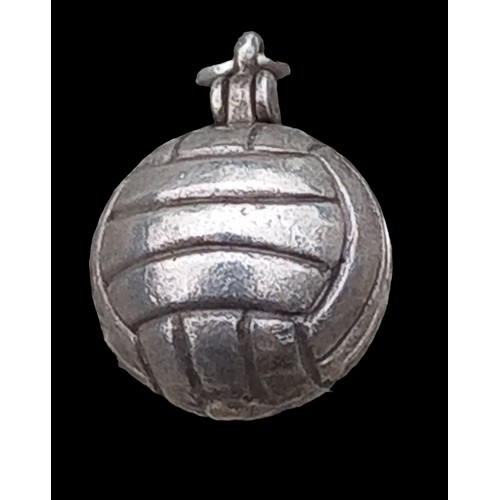 494 - A SILVER LOCKET IN THE FORM OF AN ANTIQUE FOOTBALL