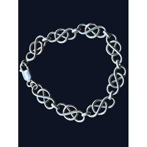 529 - A CELTIC DESIGN SILVER BRACELET 20G