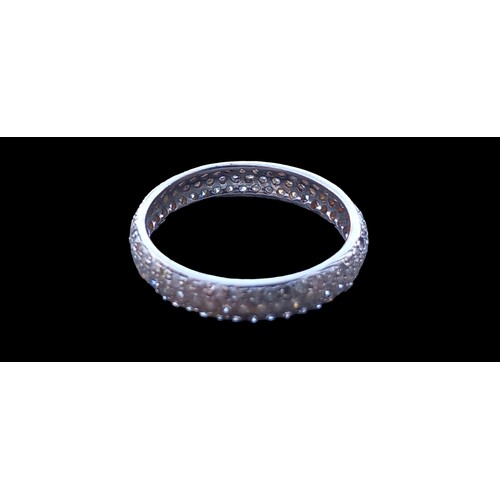 561 - A DIAMOND FULLY SET BAND RING (3.5MM DIA) IN 18ct GOLD  SIZE APPROX 0