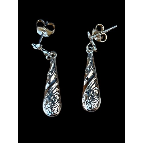 587 - A PAIR OF HALLOW PATTERNED BALLOON DROP EARRINGS IN 9ct GOLD