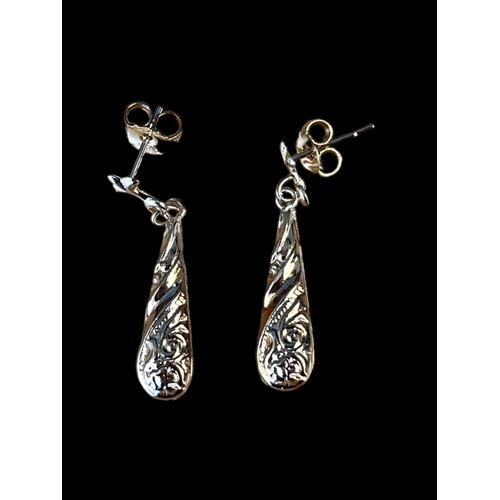 587 - A PAIR OF HALLOW PATTERNED BALLOON DROP EARRINGS IN 9ct GOLD