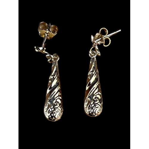 587 - A PAIR OF HALLOW PATTERNED BALLOON DROP EARRINGS IN 9ct GOLD