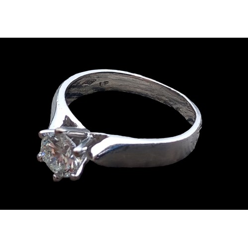 601 - AN 18CT WHITE GOLD DIAMOND SOLITAIRE RING APPROX .75CT