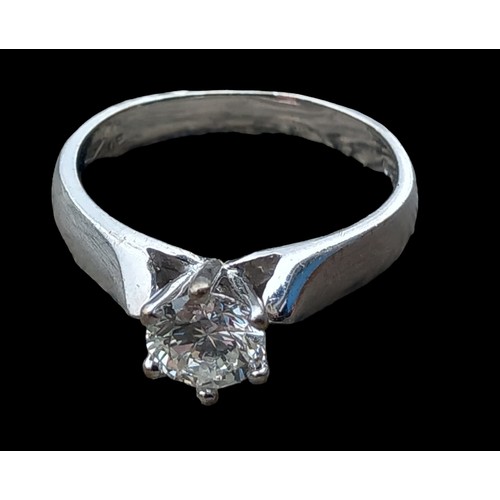 601 - AN 18CT WHITE GOLD DIAMOND SOLITAIRE RING APPROX .75CT