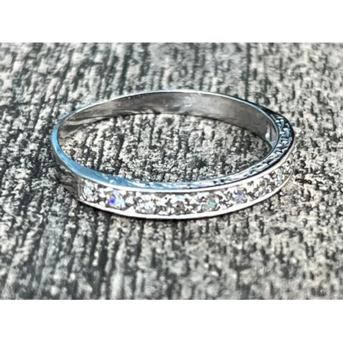 605 - AN 11 STONE DIAMOND WHITE GOLD ETERNITY BAND  SIZE S