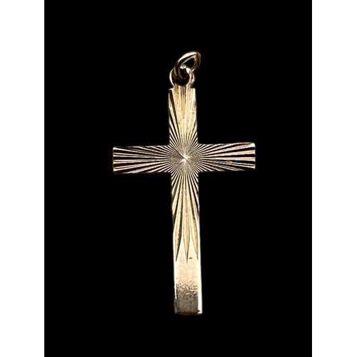 607 - A 9ct GOLD DIAMOND CUT CROSS PENDANT 1.39grm