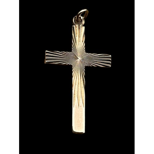 607 - A 9ct GOLD DIAMOND CUT CROSS PENDANT 1.39grm