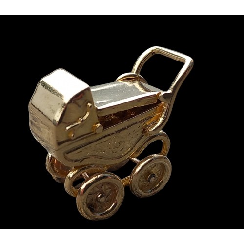 611 - A 9CT GOLD BABY CARRIAGE PRAM CHARM/PENDANT 10.8G 2CMS IN LENGTH