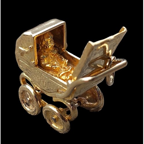 611 - A 9CT GOLD BABY CARRIAGE PRAM CHARM/PENDANT 10.8G 2CMS IN LENGTH