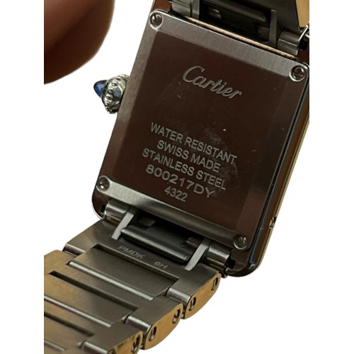 630 - A CARTIER LDS S/S TANK WATCHRECTANGULAR DIAL ,BLACK ROMAN NUMERALS ,CABOUCHON BUTTON ON BRACELET GEN... 