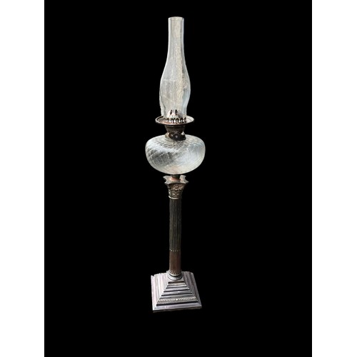 635 - A SILVER PLATED CORINTHIAN PILLAR OIL LAMP COMPLETE WITH CUT GLASS BOWL AND FUNNEL