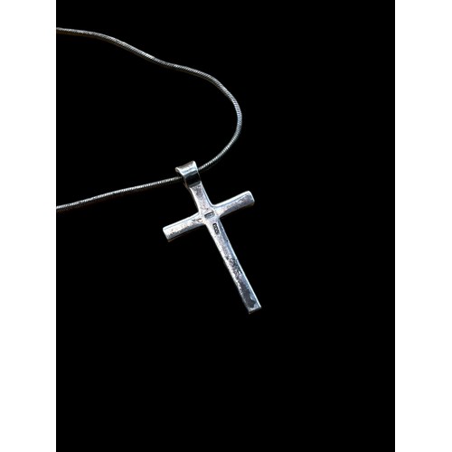 248 - A SILVER CROSS ON A SILVER CHAIN