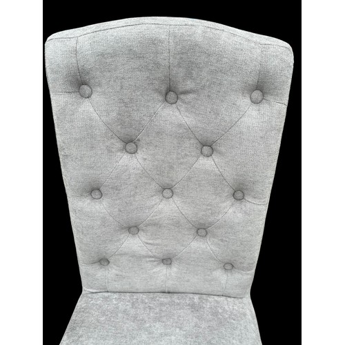 685 - A NEW BUTTON BACK CHAIR