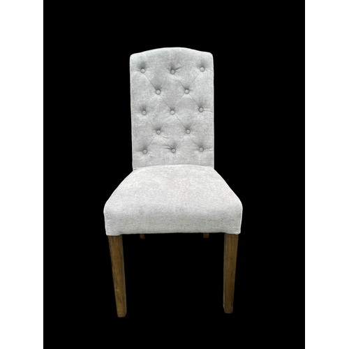 685 - A NEW BUTTON BACK CHAIR