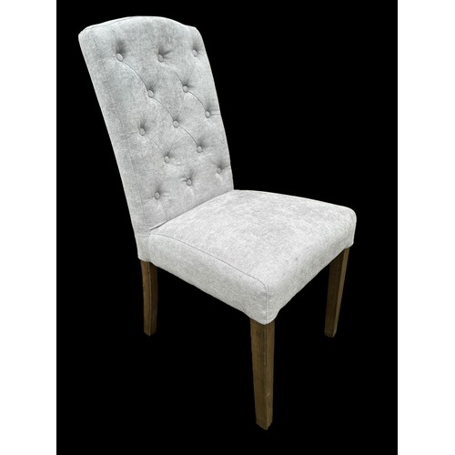 685 - A NEW BUTTON BACK CHAIR